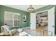 Bright home office with French doors opening to the living room at 16511 Cornwall Ln, Bradenton, FL 34202