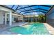 Inviting screened pool and spa with spacious patio at 16511 Cornwall Ln, Bradenton, FL 34202