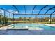Inviting screened pool and spa with spacious patio at 16511 Cornwall Ln, Bradenton, FL 34202