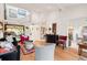 Spacious living room with hardwood floors and high ceilings at 1704 Pelican Cove Rd # T138, Sarasota, FL 34231