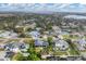 Aerial view of waterfront property, showcasing surrounding homes at 1739 Shelburne Ln, Sarasota, FL 34231