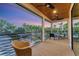 Relaxing balcony with outdoor furniture and sunset views at 1739 Shelburne Ln, Sarasota, FL 34231