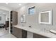 Double vanity bathroom with modern finishes and sleek cabinetry at 1739 Shelburne Ln, Sarasota, FL 34231