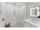 Modern bathroom with a frameless glass shower and white subway tile at 1739 Shelburne Ln, Sarasota, FL 34231
