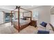 Main bedroom with a canopy bed and private access to the pool at 1739 Shelburne Ln, Sarasota, FL 34231