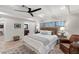 Guest bedroom with a king-size bed and ceiling fan at 1739 Shelburne Ln, Sarasota, FL 34231