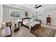 Spacious bedroom with a king-size bed and wood floors at 1739 Shelburne Ln, Sarasota, FL 34231