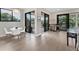 Bright dining area with white table and chairs, near balcony at 1739 Shelburne Ln, Sarasota, FL 34231