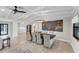 Bright dining room features a dark wood table and statement art at 1739 Shelburne Ln, Sarasota, FL 34231