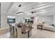 Spacious dining area with modern chandelier and hardwood floors at 1739 Shelburne Ln, Sarasota, FL 34231