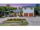 Modern two-story house with attractive landscaping and two-car garage at 1739 Shelburne Ln, Sarasota, FL 34231