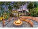 Relaxing outdoor fire pit area, perfect for entertaining at 1739 Shelburne Ln, Sarasota, FL 34231