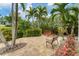 Tranquil hot tub area nestled amongst tropical landscaping at 1739 Shelburne Ln, Sarasota, FL 34231