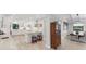 Modern white kitchen with island and stainless steel appliances at 1739 Shelburne Ln, Sarasota, FL 34231