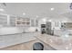 Sleek white kitchen with ample counter space and stainless steel appliances at 1739 Shelburne Ln, Sarasota, FL 34231