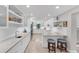 Bright kitchen featuring a large island and white cabinets at 1739 Shelburne Ln, Sarasota, FL 34231