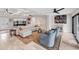 Elegant living room with sectional sofa and large artwork at 1739 Shelburne Ln, Sarasota, FL 34231