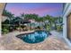 Inviting kidney-shaped pool with patio and pergola at 1739 Shelburne Ln, Sarasota, FL 34231