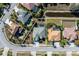 Aerial view of a house and surrounding neighborhood at 1743 Pinyon Pine Dr, Sarasota, FL 34240
