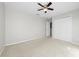 Simple bedroom with carpet and closet at 1743 Pinyon Pine Dr, Sarasota, FL 34240