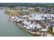 Aerial view of a waterfront community with shops and restaurants at 1743 Pinyon Pine Dr, Sarasota, FL 34240