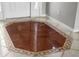 Elegant foyer with intricate marble tile floor design at 1743 Pinyon Pine Dr, Sarasota, FL 34240