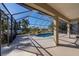 Spacious screened pool area with a spa at 1743 Pinyon Pine Dr, Sarasota, FL 34240