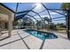 Inviting screened pool and spa, perfect for relaxation at 1743 Pinyon Pine Dr, Sarasota, FL 34240