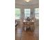 Bright dining area with a built-in window seat and tile flooring, perfect for Gathering meals at 1877 Dragonfly Ave, North Port, FL 34288