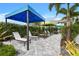 Private cabanas with lounge chairs for ultimate relaxation at 2724 Butterfly Jasmine Trl, Sarasota, FL 34240