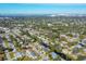 Aerial view of residential neighborhood showcasing homes and landscape at 2961 Homasassa Rd, Sarasota, FL 34239