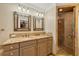 Bathroom with double vanity, granite countertop, and walk-in shower at 2961 Homasassa Rd, Sarasota, FL 34239