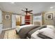 Main bedroom with ensuite bathroom and built-in shelving at 2961 Homasassa Rd, Sarasota, FL 34239