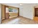 Bedroom with tile floors, window, and double closets at 2961 Homasassa Rd, Sarasota, FL 34239