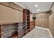 Large walk-in closet with shelving and drawers at 2961 Homasassa Rd, Sarasota, FL 34239