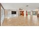 Spacious living area with open floor plan and views to the kitchen at 2961 Homasassa Rd, Sarasota, FL 34239