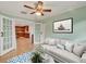 Living room with view into kitchen and light-colored sofa at 2961 Homasassa Rd, Sarasota, FL 34239