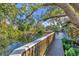 Charming waterfront deck overlooks peaceful canal; perfect for relaxing at 2961 Homasassa Rd, Sarasota, FL 34239