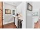 Charming butler pantry with wine fridge, sink, and plenty of cabinet space at 4311 Bay Shore Rd, Sarasota, FL 34234