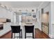 Bright kitchen featuring a large center island, modern appliances, and beautiful finishes at 4311 Bay Shore Rd, Sarasota, FL 34234