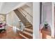 Beautiful staircase with decorative risers, and hardwood steps at 4311 Bay Shore Rd, Sarasota, FL 34234