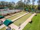 Community bocce ball courts with seating at 4423 Via Del Villetti Dr, Venice, FL 34293