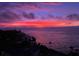 Stunning sunset view over the ocean and coastline at 4822 Ocean Blvd # 8B, Sarasota, FL 34242