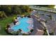 Resort-style pool with lounge chairs and parking at 5225 Grove Mill Loop, Bradenton, FL 34211