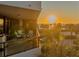 Spacious balcony with ocean views and sunset at 565 Sanctuary Dr # A203, Longboat Key, FL 34228
