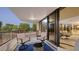 Serene balcony with seating area and view at 565 Sanctuary Dr # A203, Longboat Key, FL 34228