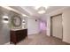Elegant condo entryway with modern decor and elevator access at 565 Sanctuary Dr # A203, Longboat Key, FL 34228