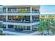 Modern building with multiple balconies and ocean views at 565 Sanctuary Dr # A203, Longboat Key, FL 34228