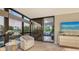 Comfortable living space with access to a relaxing balcony at 565 Sanctuary Dr # A203, Longboat Key, FL 34228