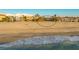 Beachfront property with ocean view and neighboring houses visible at 639 Cornwell On The Gulf, Venice, FL 34285